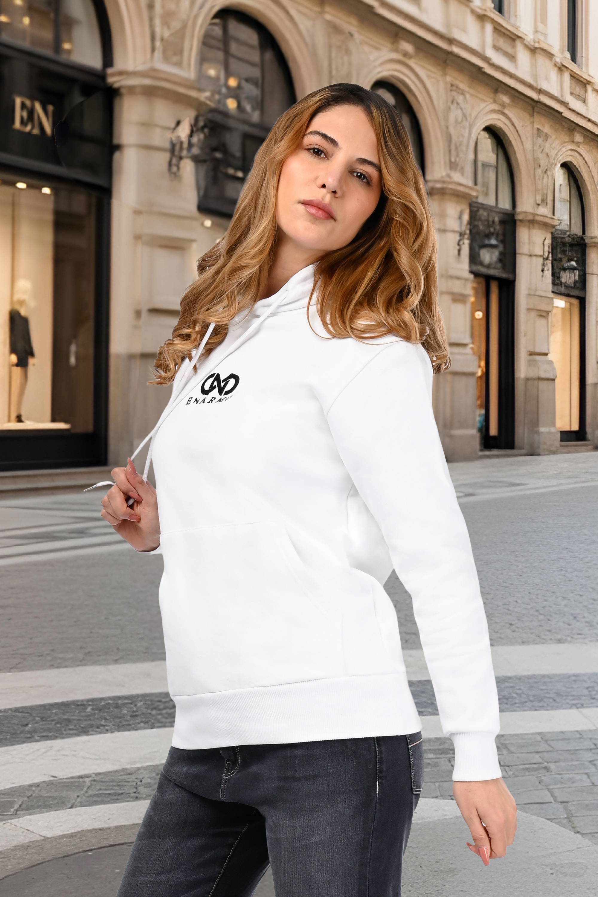 Unisex luxury cotton hoodie worn by a woman